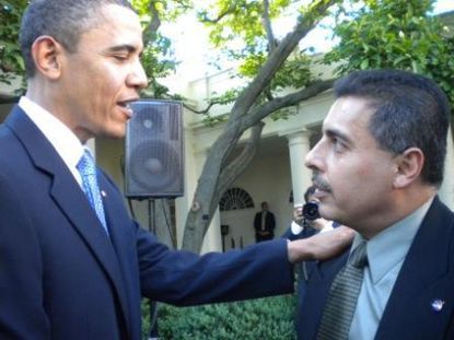 Hernández, junto al presidente Obama.